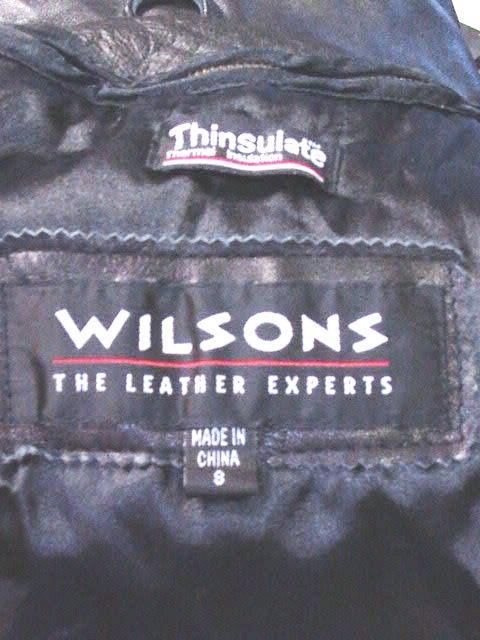 Jacket manufacturer label — archival detail.