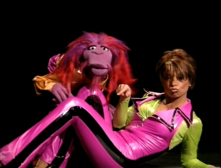 Paula Abdul performing with Clifford and the Muppets.